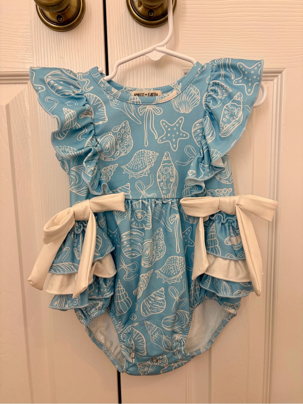 Blue Seashell Ruffle One-Piece with Cream Bows NWOT